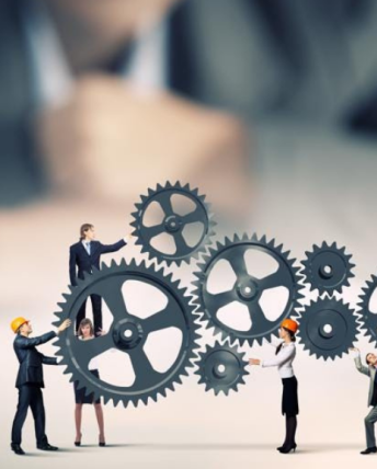 engineers holding gears